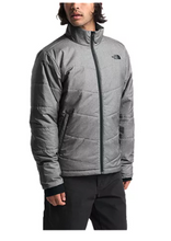 Load image into Gallery viewer, Man wearing a grey North Face puffer jacket.
