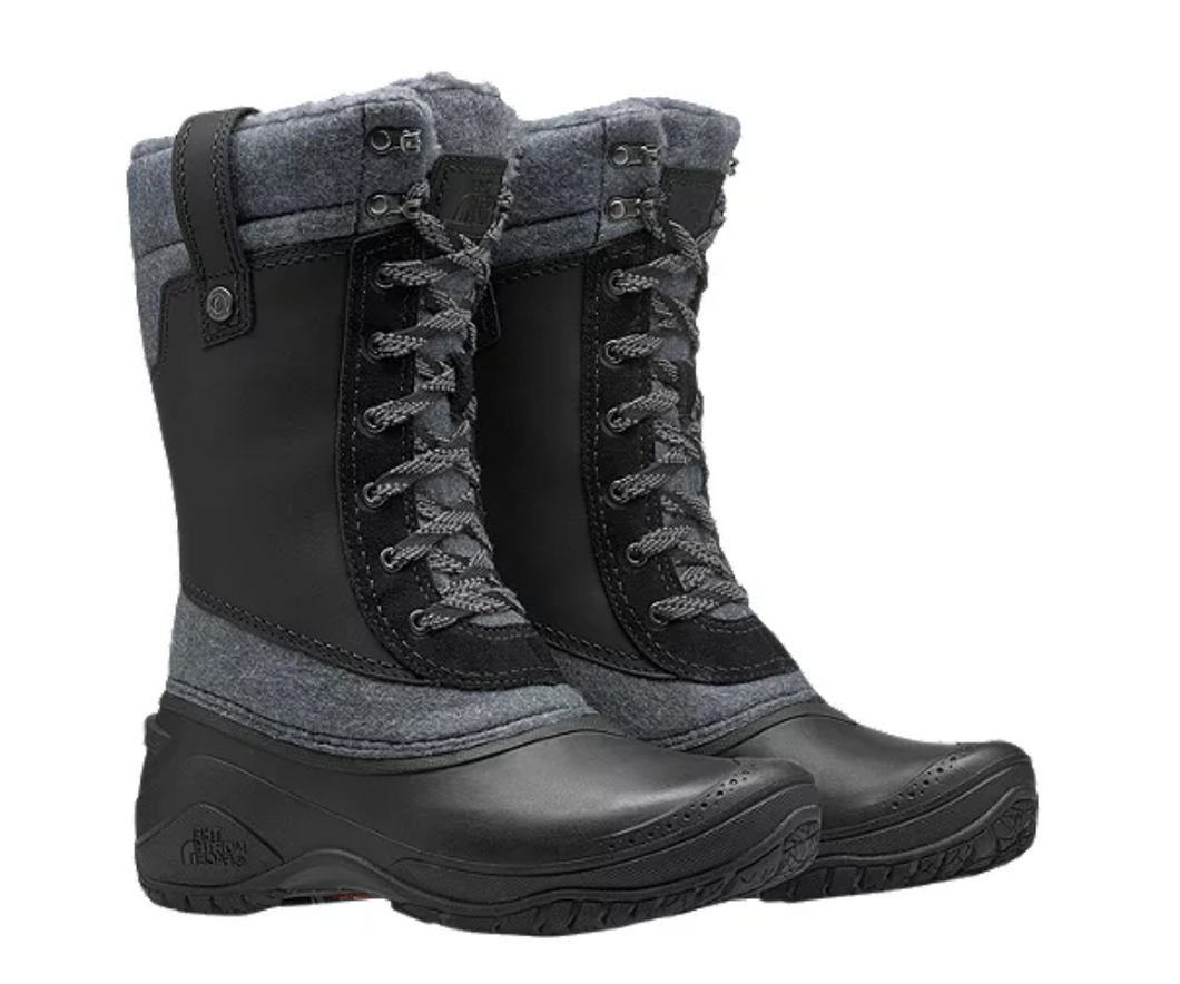 Women's black and grey North Face winter boots. Front view.