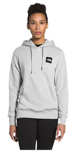 Woman wearing a The North Face grey hoodie.