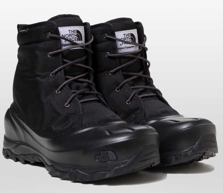 Product image of men's The North Face winter boots with laces. Side view.
